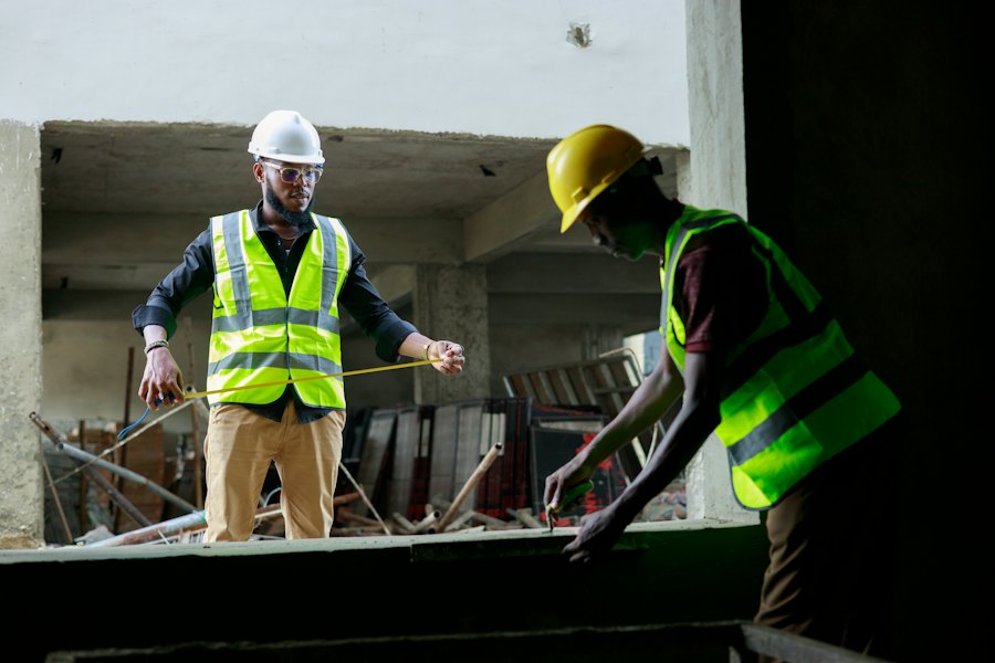 Construction crew reviewing work at a job site